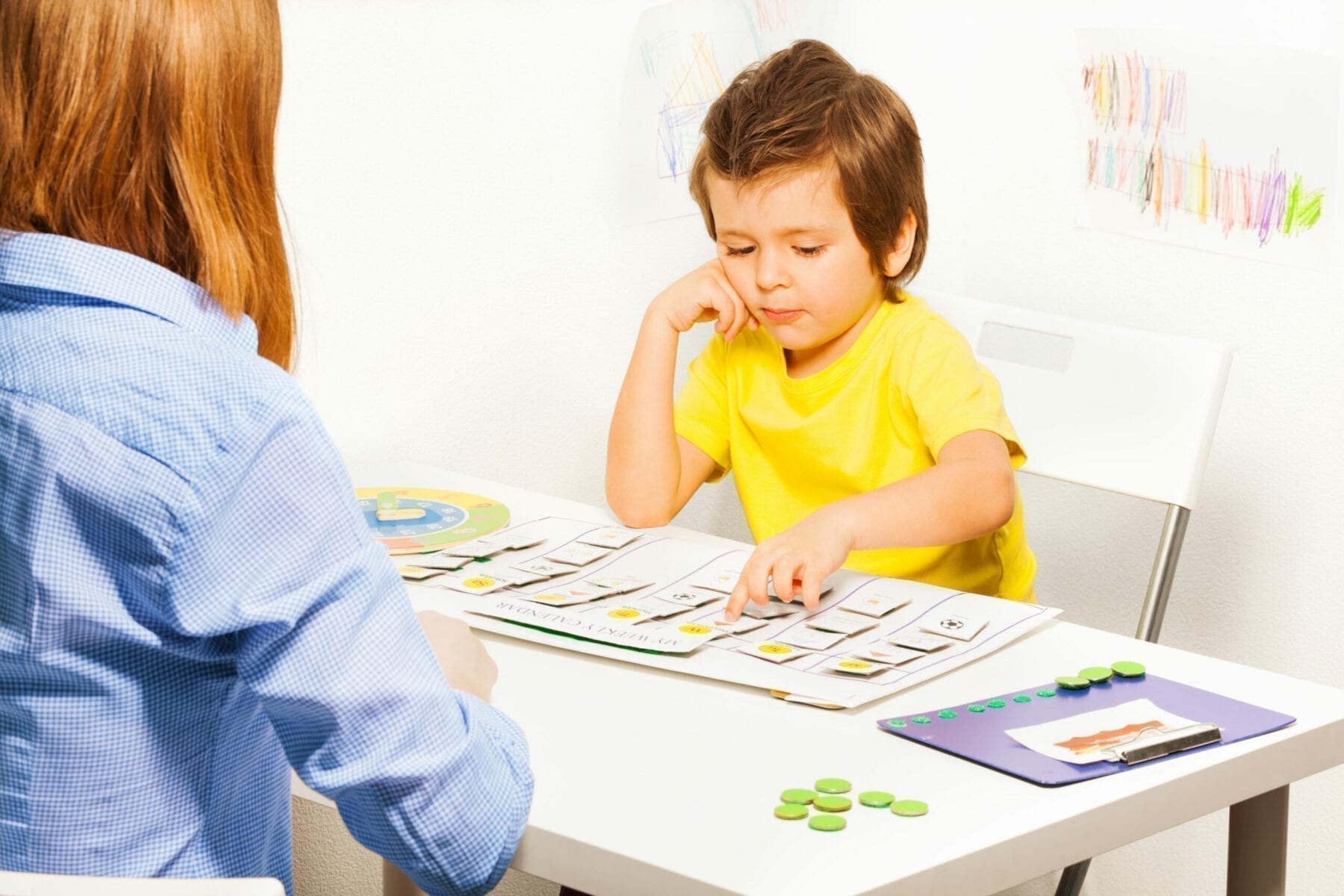 Boy in ABA therapy session