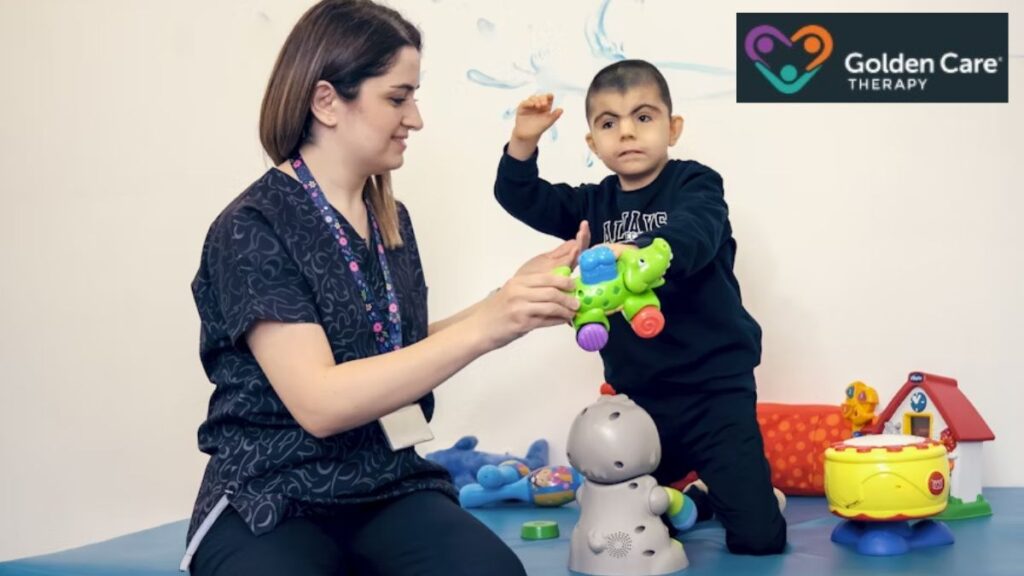 Autism behavioral therapy session where a female teacher demonstrates how to play with plastic toys.